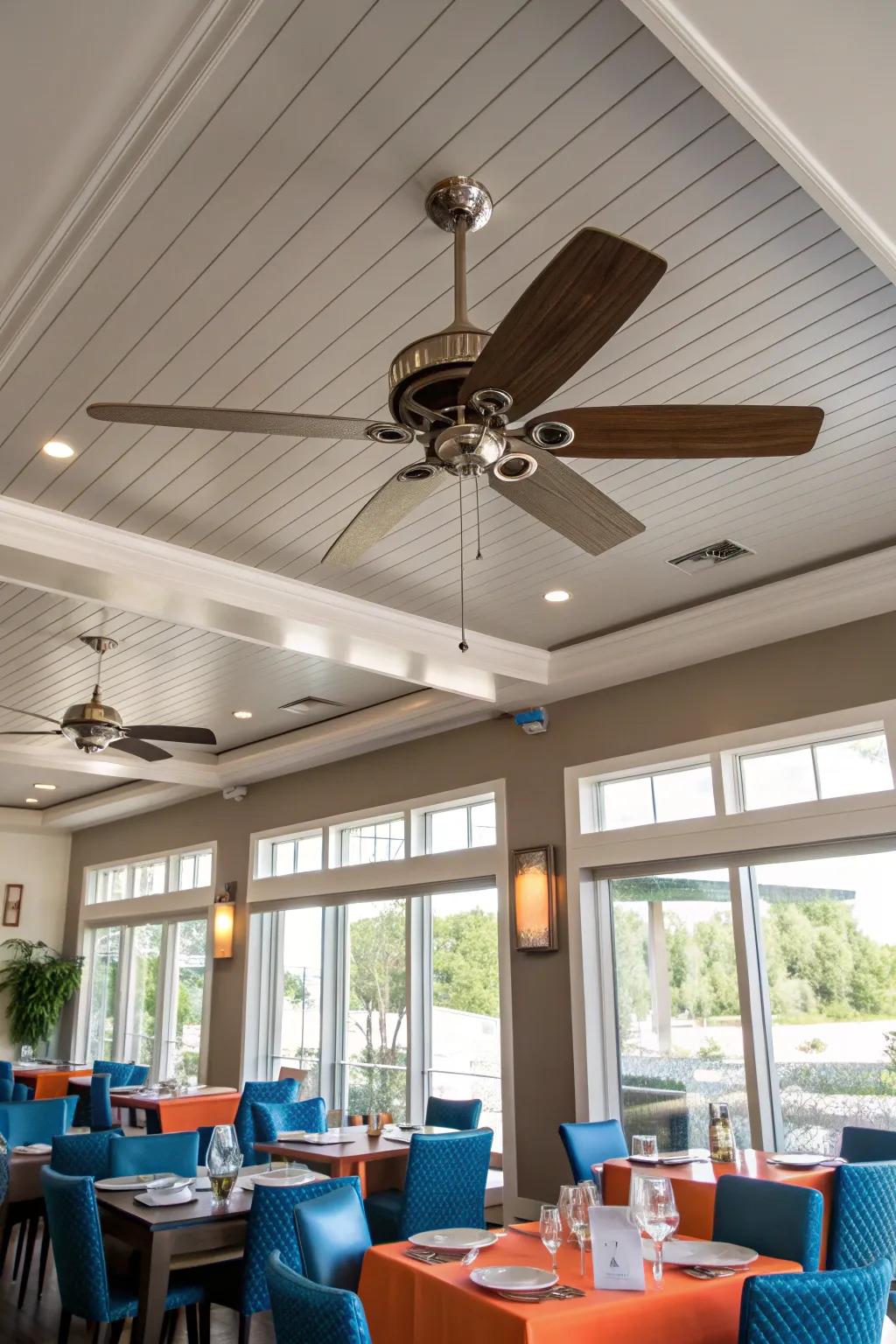 Sleek and effective: A low-profile ceiling fan perfect for high-ceilinged dining rooms.