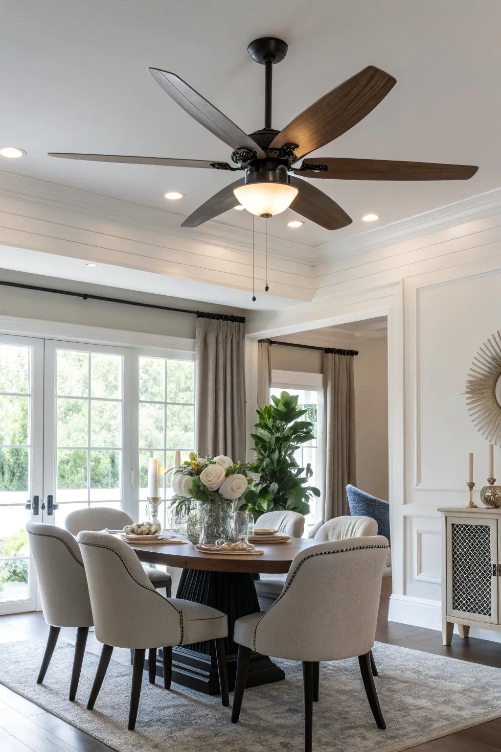 Embrace modern elegance with a sleek ceiling fan that enhances your dining space's contemporary vibe.