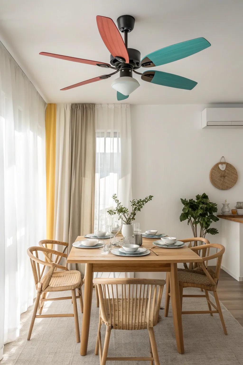 Add a splash of fun with a colorful ceiling fan that enlivens your dining space. 🌈 #ColorfulDecor #DiningRoomFun