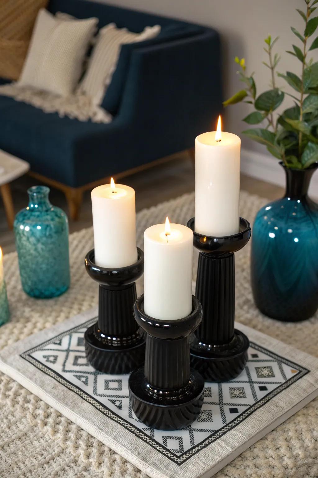 Create a cozy glow with a trio of white candles in sleek black holders.