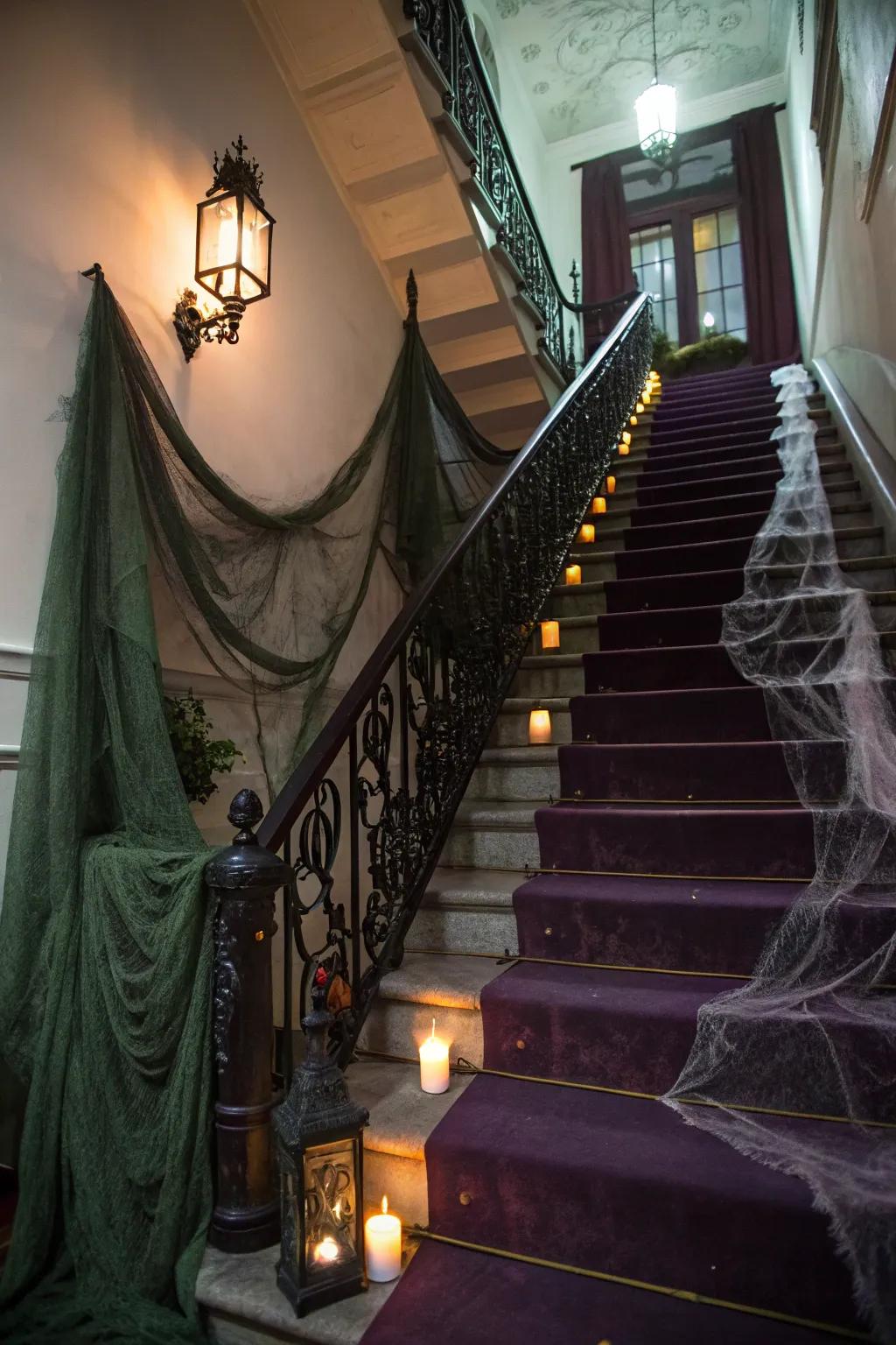 Create a haunted house vibe on your staircase with draped cloth and spider webs.