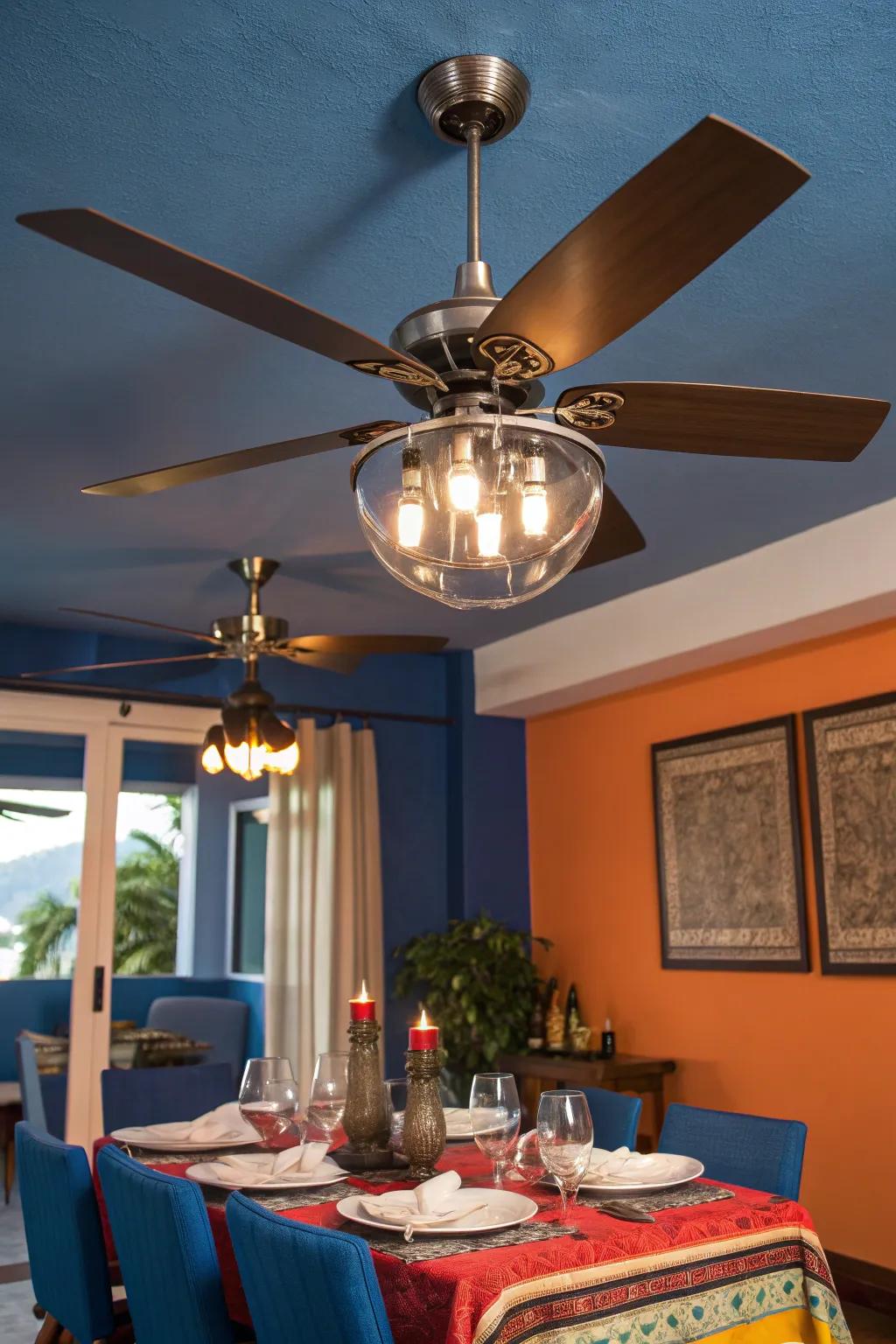 Illuminate and cool your dining space simultaneously with a ceiling fan that offers dual functionality. 💡 #HomeInspiration #DiningRoomStyle